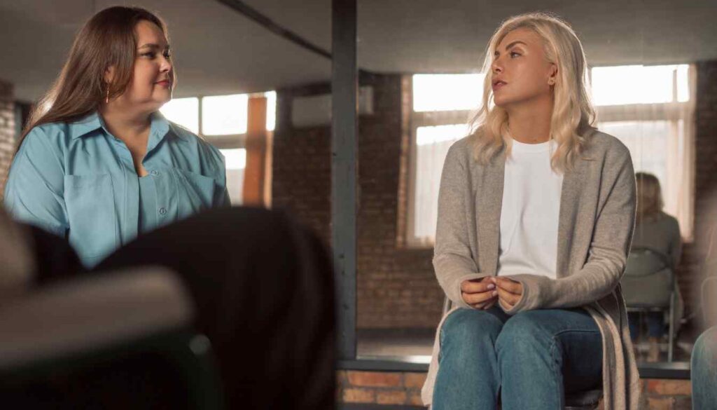 Women talking in a support group during drug and alcohol detox